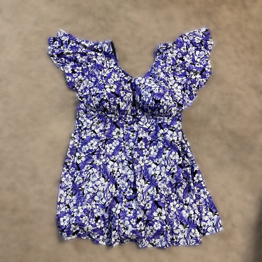 Purple and white, flutter-sleeved swim dress.